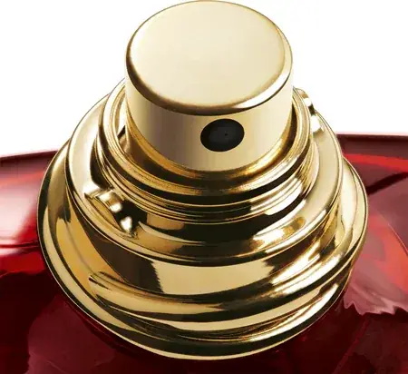 emporio armani stronger with you tobacco 100ml gold atomizer close up نمای نزدیک افشانهی طلایی و درپوش بطری استرانگر ویت یو توباکو روی شیشهی قرمز